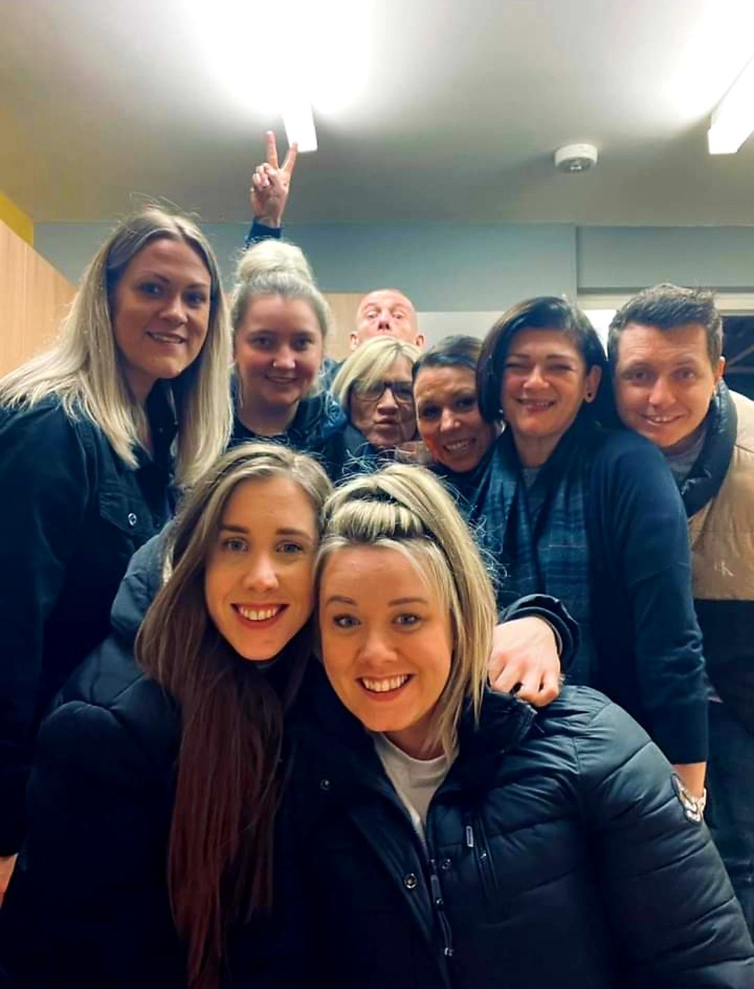 A happy group selfie after an event with Nikki