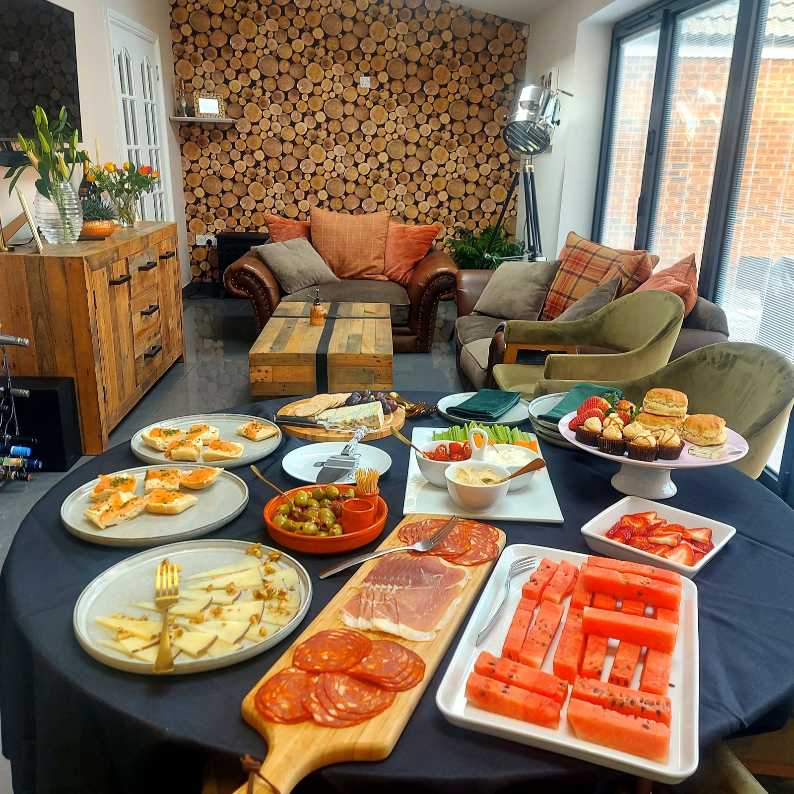 A table laid with food, ready for an evening with friends